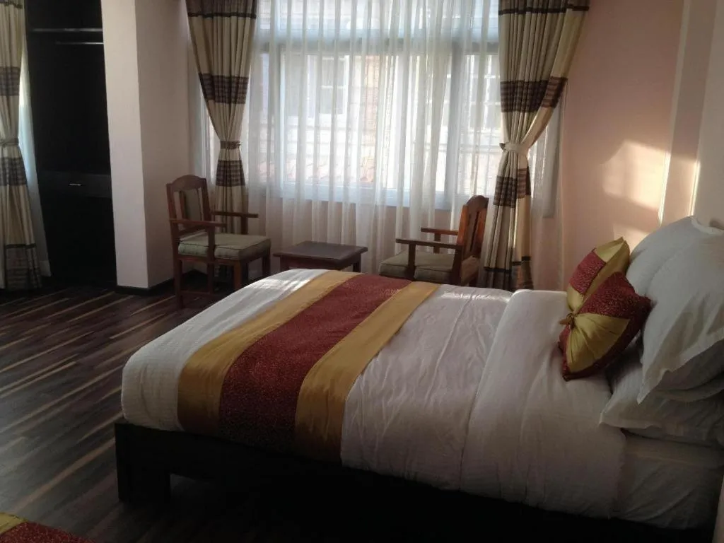 Bed in De Hotel Veda