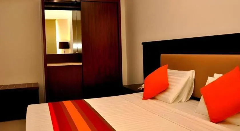 Bed in Sai Sea City Hotel