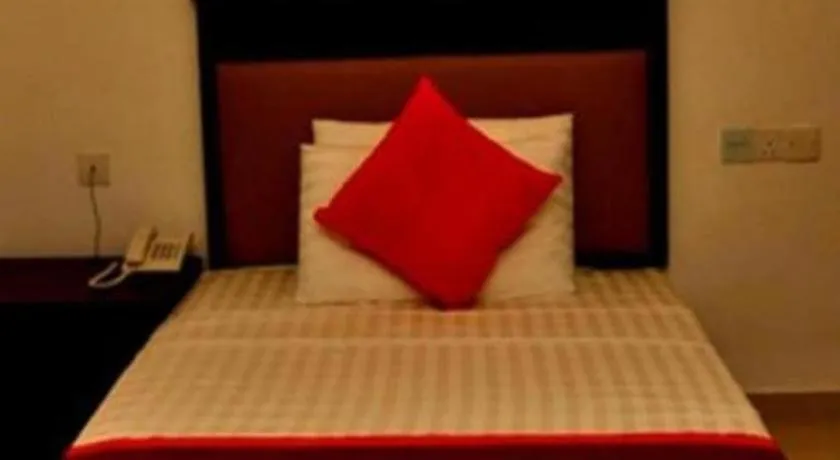 Bed in Sai Sea City Hotel