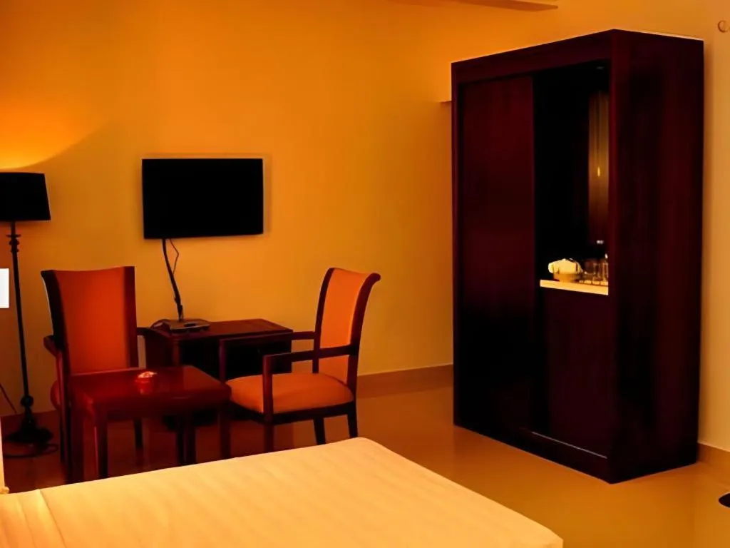 Bed in Sai Sea City Hotel