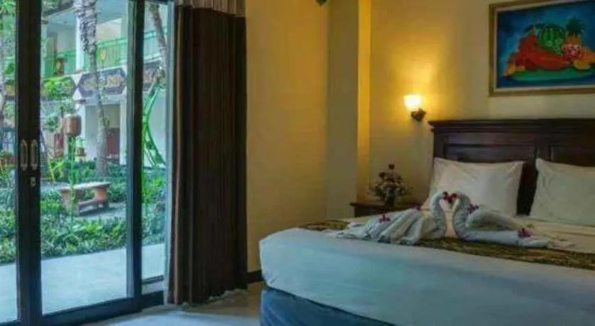 Bed in Yusro Hotel Restaurant & Convention