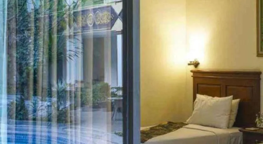 Bed in Yusro Hotel Restaurant & Convention