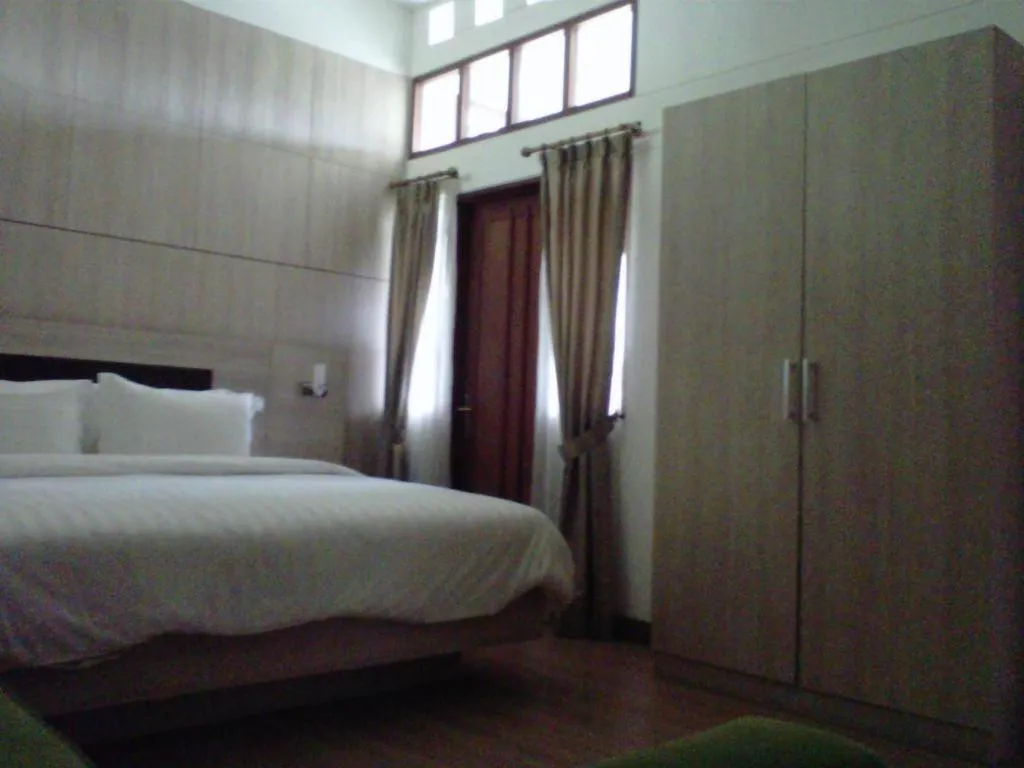 Bed in Bumi Bandhawa Hotel
