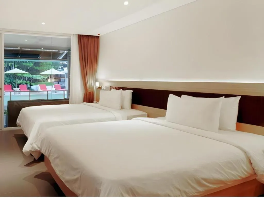 Bed in Bumi Bandhawa Hotel