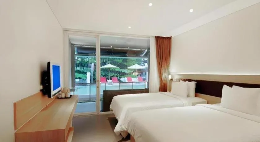 Bed in Bumi Bandhawa Hotel