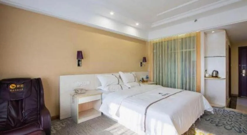 Bed in Chuanghui Business Hotel