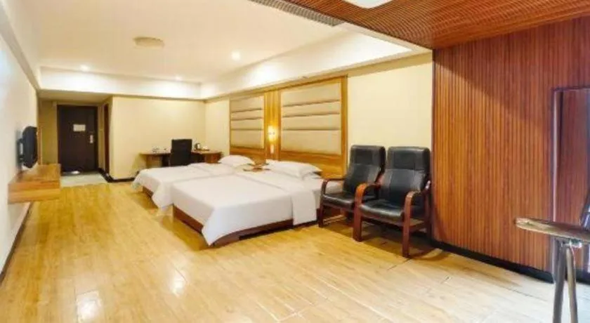 Bed in Chuanghui Business Hotel