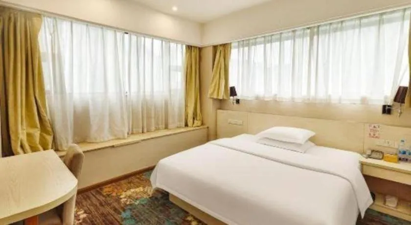 Bed in Chuanghui Business Hotel