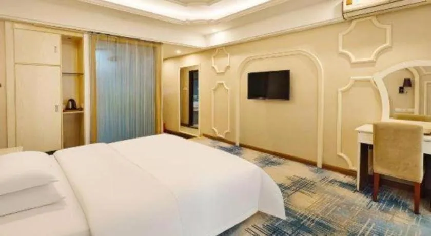 Bed in Chuanghui Business Hotel