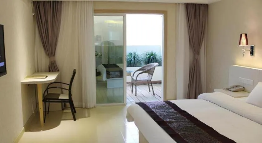 Bed in Chuanghui Business Hotel