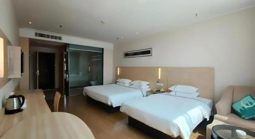 Bed in City Comfort Inn Jingzhou Ancient City Taiyue Road