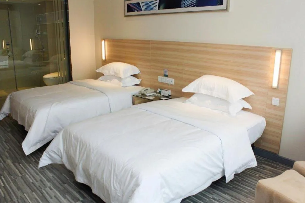 Bed in City Comfort Inn Jingzhou Ancient City Taiyue Road