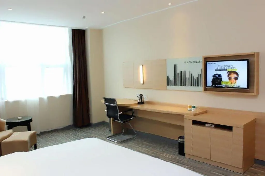 Bed in City Comfort Inn Jingzhou Ancient City Taiyue Road