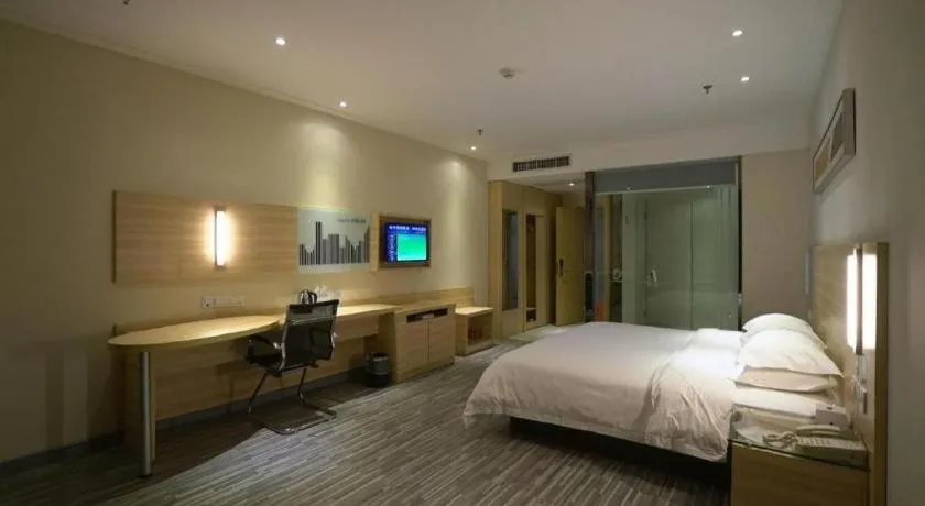 Bed in City Comfort Inn Jingzhou Ancient City Taiyue Road