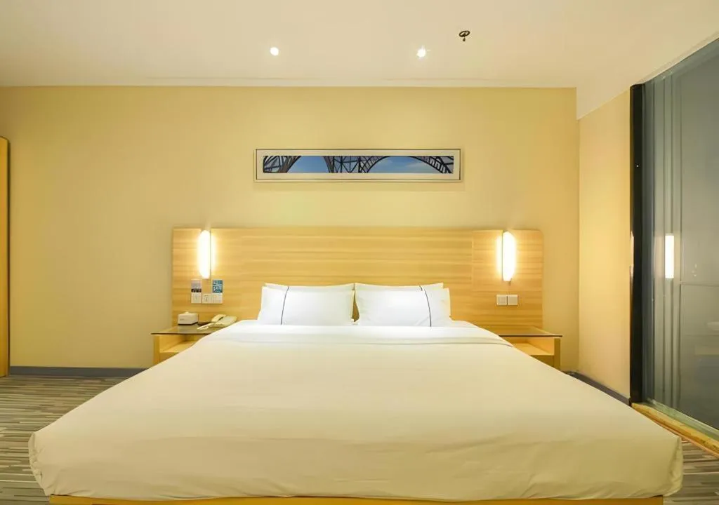 Bed in City Comfort Inn Jingzhou Ancient City Taiyue Road