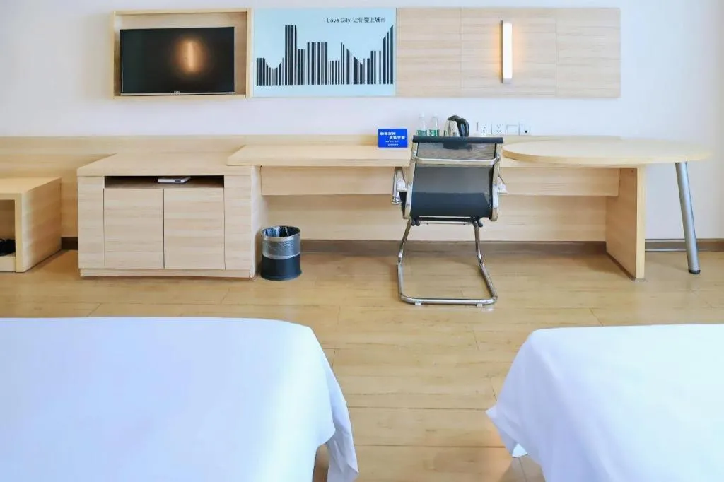 Bed in City Comfort Inn Jingzhou Ancient City Taiyue Road