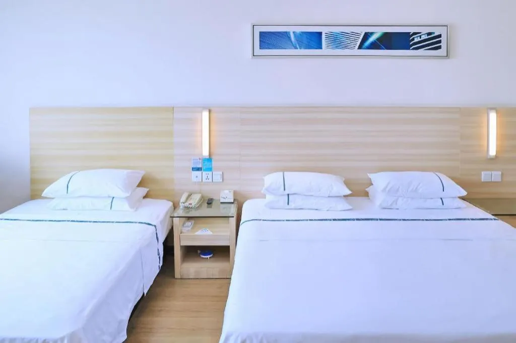 Bed in City Comfort Inn Jingzhou Ancient City Taiyue Road