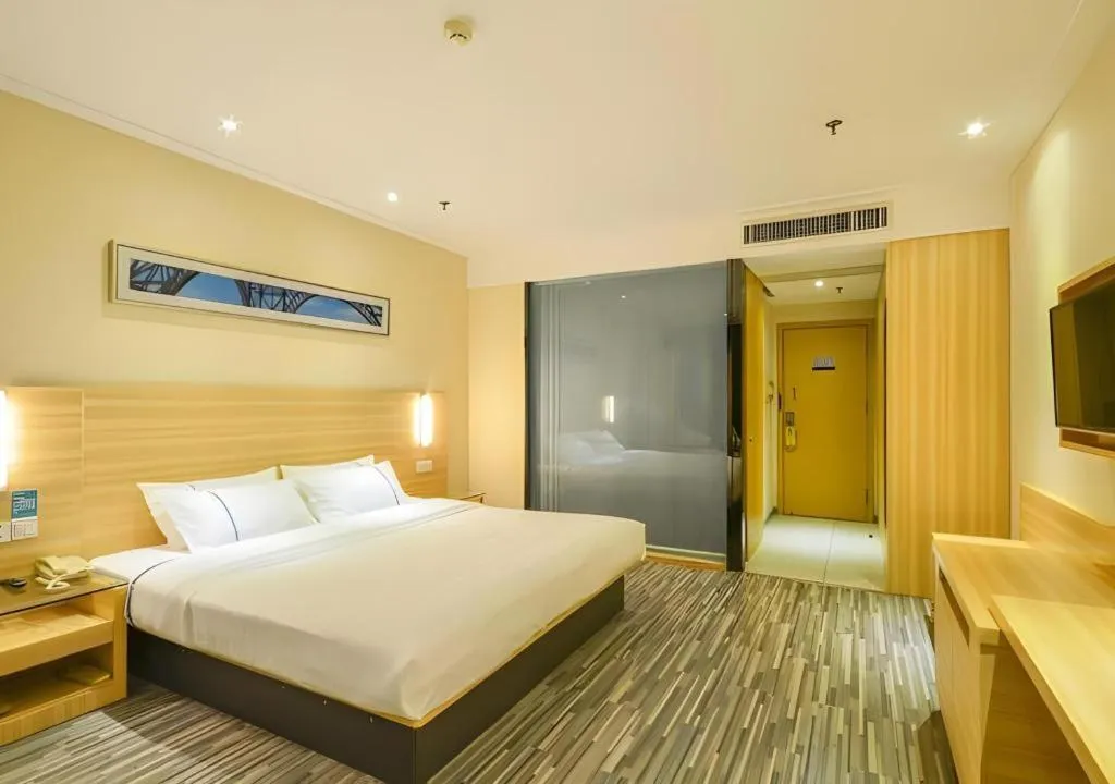 Bed in City Comfort Inn Jingzhou Ancient City Taiyue Road