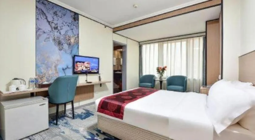 Bed in Dalian Bohai Pearl Hotel