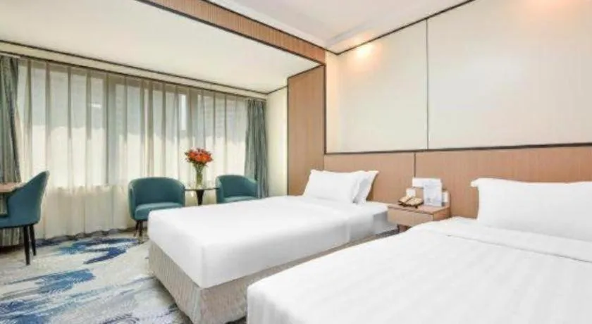 Bed in Dalian Bohai Pearl Hotel