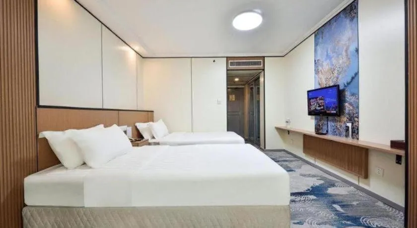 Bed in Dalian Bohai Pearl Hotel