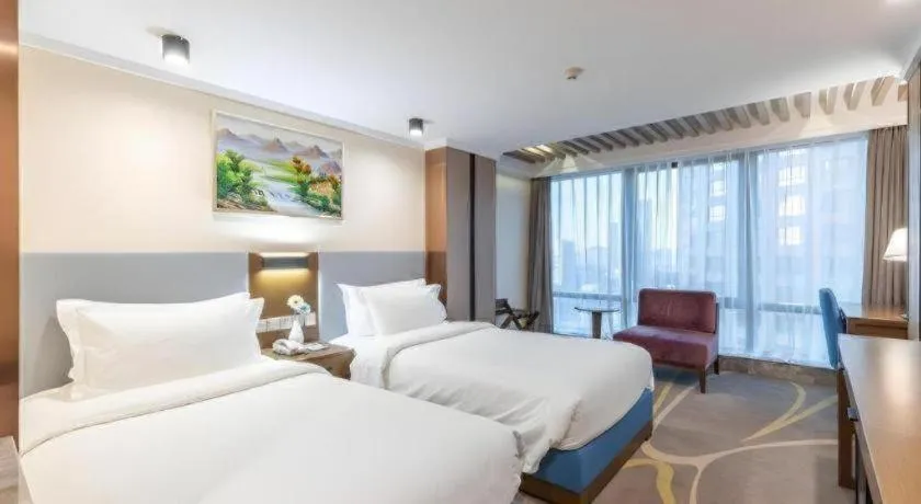 Bed in Dalian Bohai Pearl Hotel