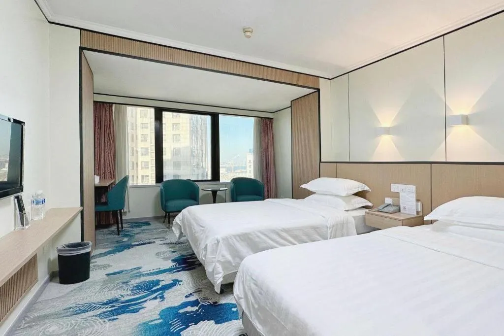 Bed in Dalian Bohai Pearl Hotel