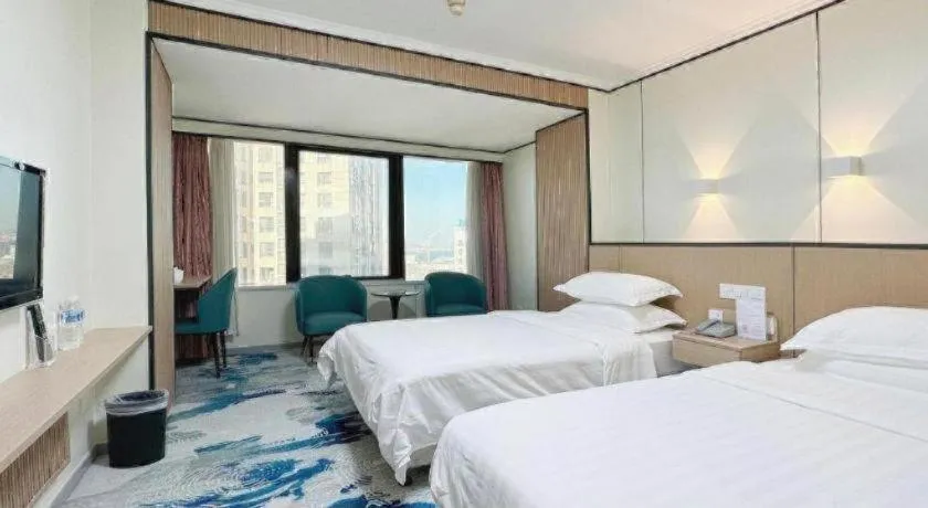 Bed in Dalian Bohai Pearl Hotel