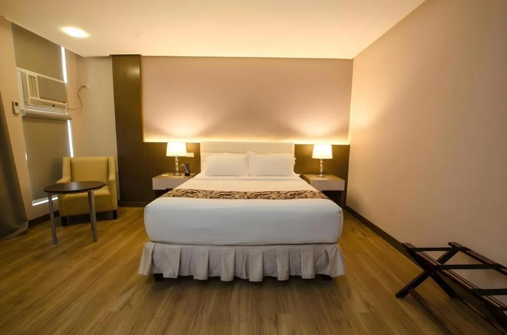 Bed in Oryza Hotel