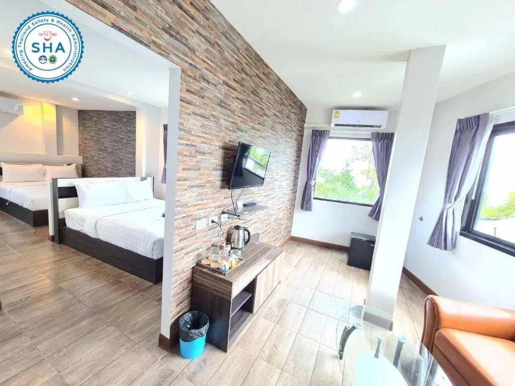 Bed in Rainbow Sky Hotel Samet