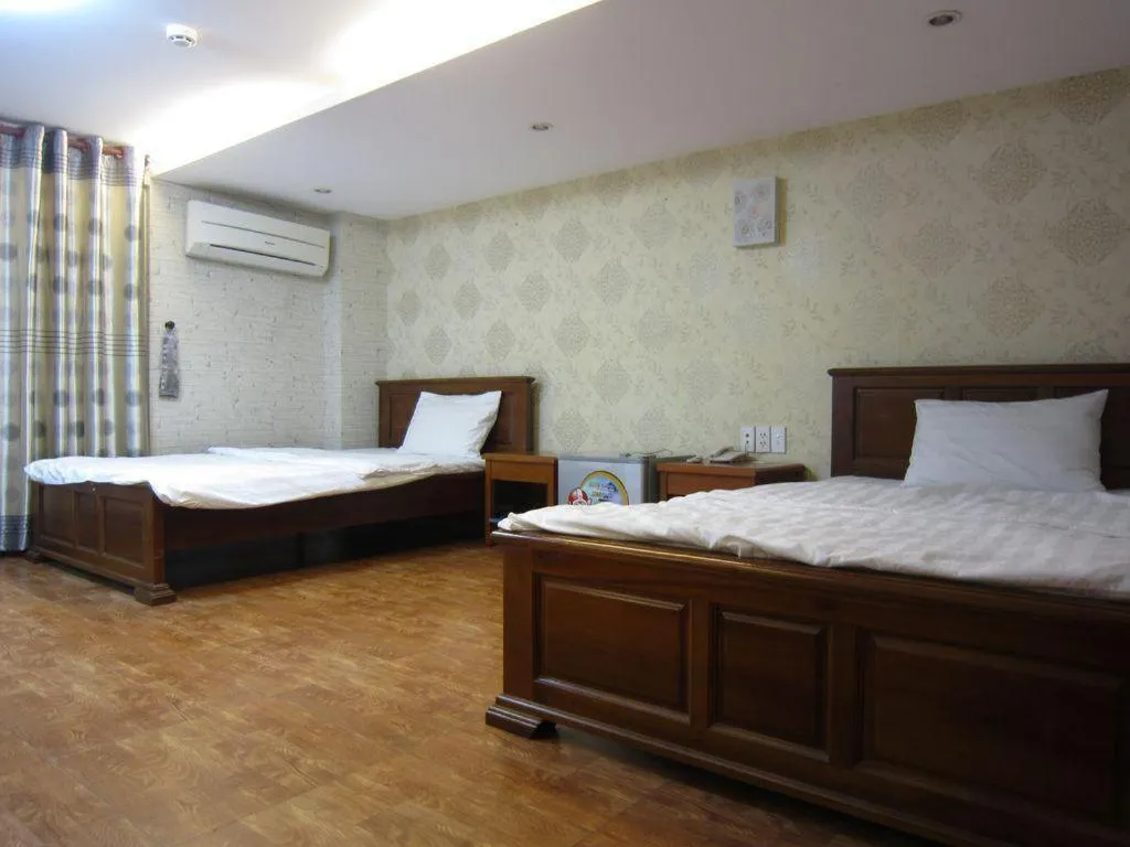 Bed in Melody Viet Hotel