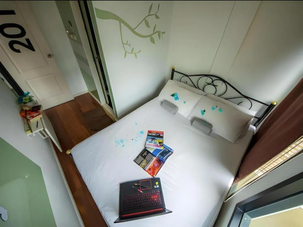 Bed in The Chilli Bangkok Hotel