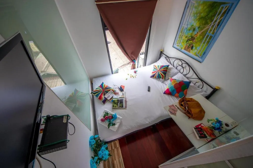 Bed in The Chilli Bangkok Hotel