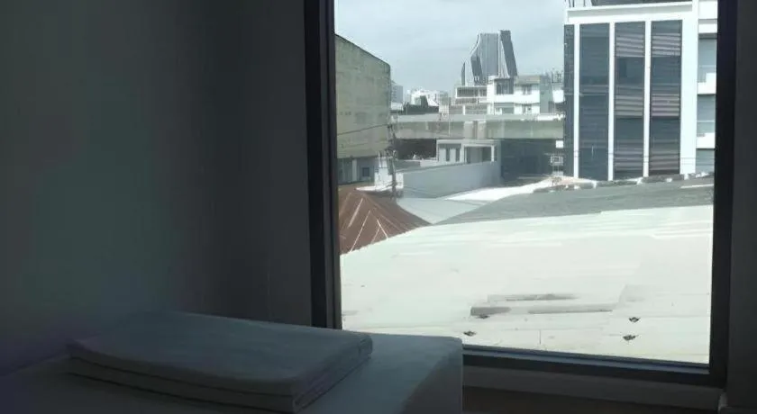 Bed in The Chilli Bangkok Hotel