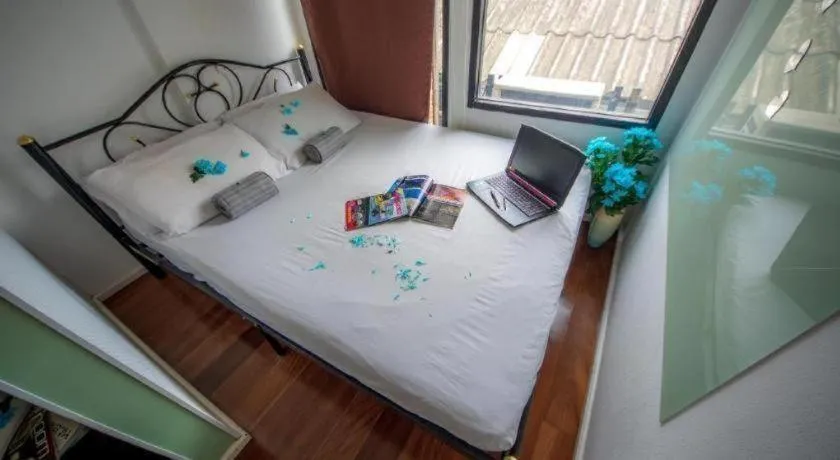 Bed in The Chilli Bangkok Hotel