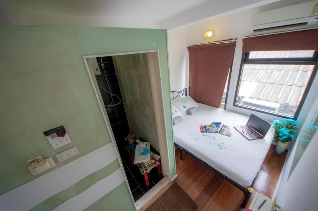 Bed in The Chilli Bangkok Hotel