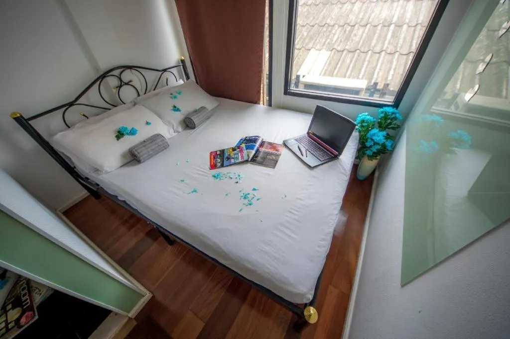 Bed in The Chilli Bangkok Hotel