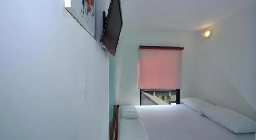 Bed in The Chilli Bangkok Hotel