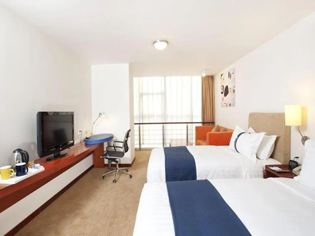 Bed in Holiday Inn Express Tianjin Dongli By IHG