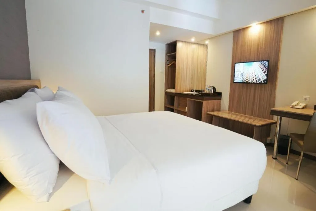 Bed in My Tower Hotel Surabaya
