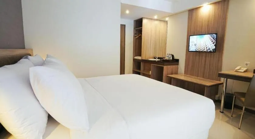 Bed in My Tower Hotel Surabaya