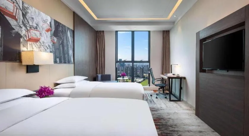 Bed in Ramada Encore by Wyndham Chongqing Yubei