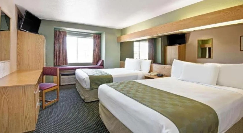 Bed in Microtel Inn & Suites by Wyndham Albuquerque West