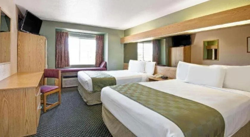 Bed in Microtel Inn & Suites by Wyndham Albuquerque West