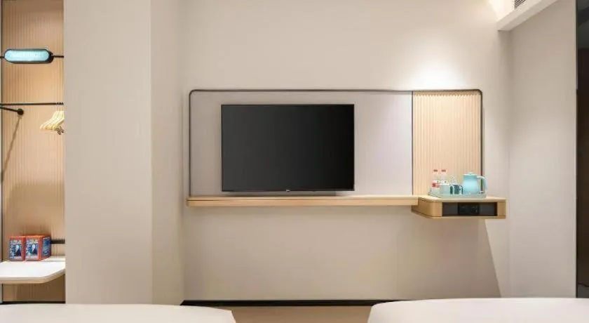 Bed in City Comfort Inn Jiangmen Xinhui Xiangshan Park