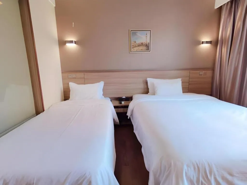 Bed in Hanyong Hotel Shenzhen International Exhibition Center