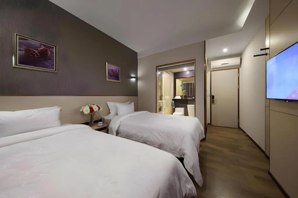 Bed in Hanyong Hotel Shenzhen International Exhibition Center