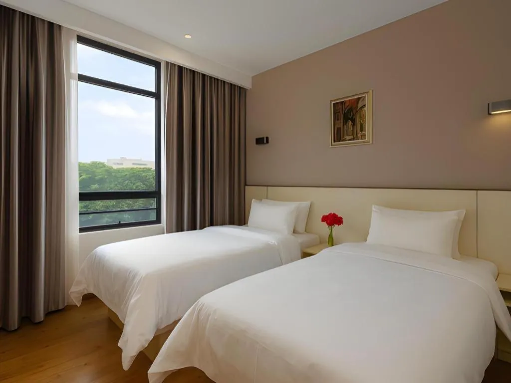 Bed in Hanyong Hotel Shenzhen International Exhibition Center