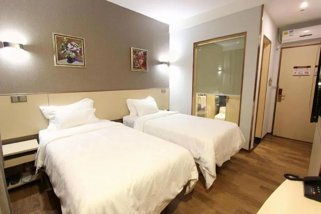 Bed in Hanyong Hotel Shenzhen International Exhibition Center