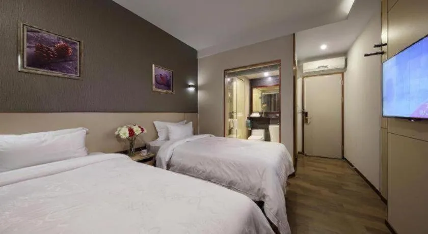 Bed in Hanyong Hotel Shenzhen International Exhibition Center